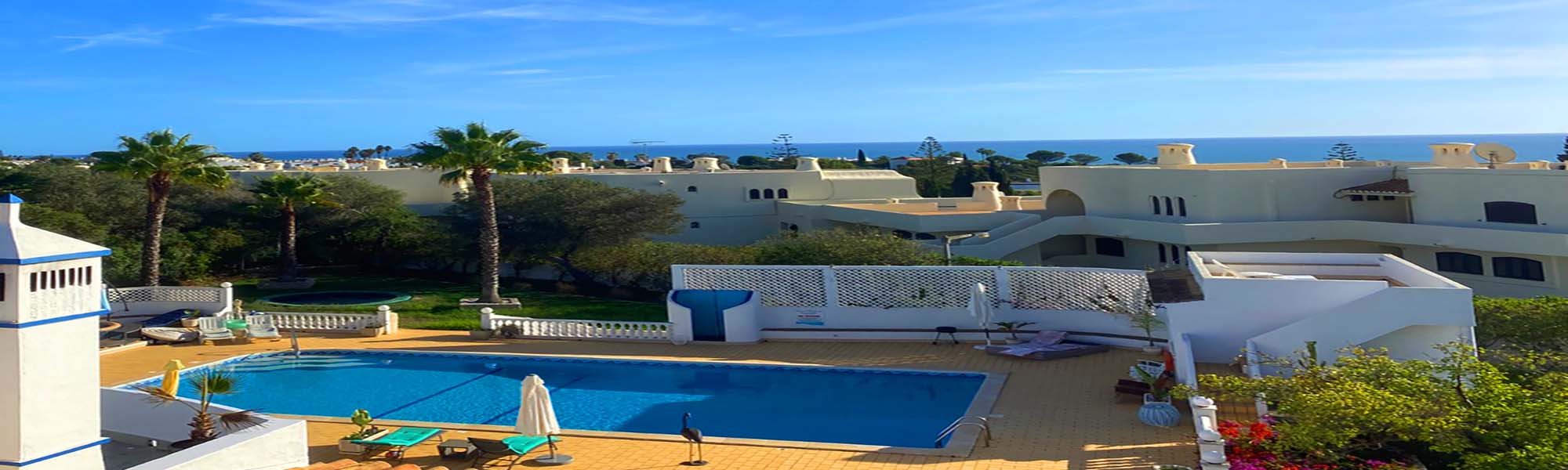 Ocean‑view neighborhood at sunset