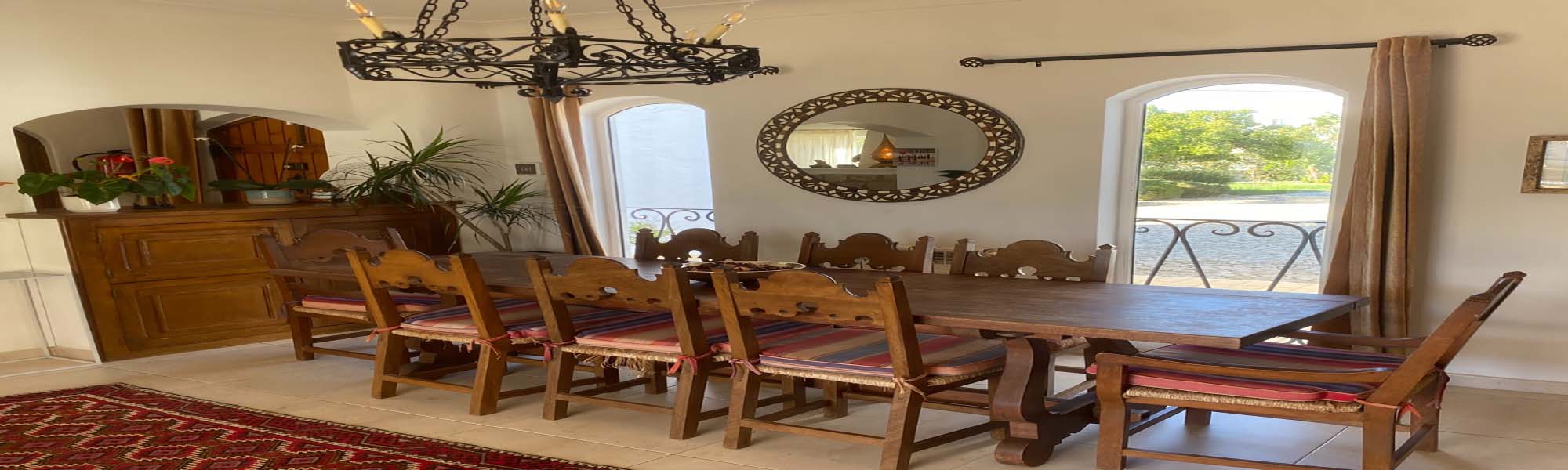 Large pool terrace with palms